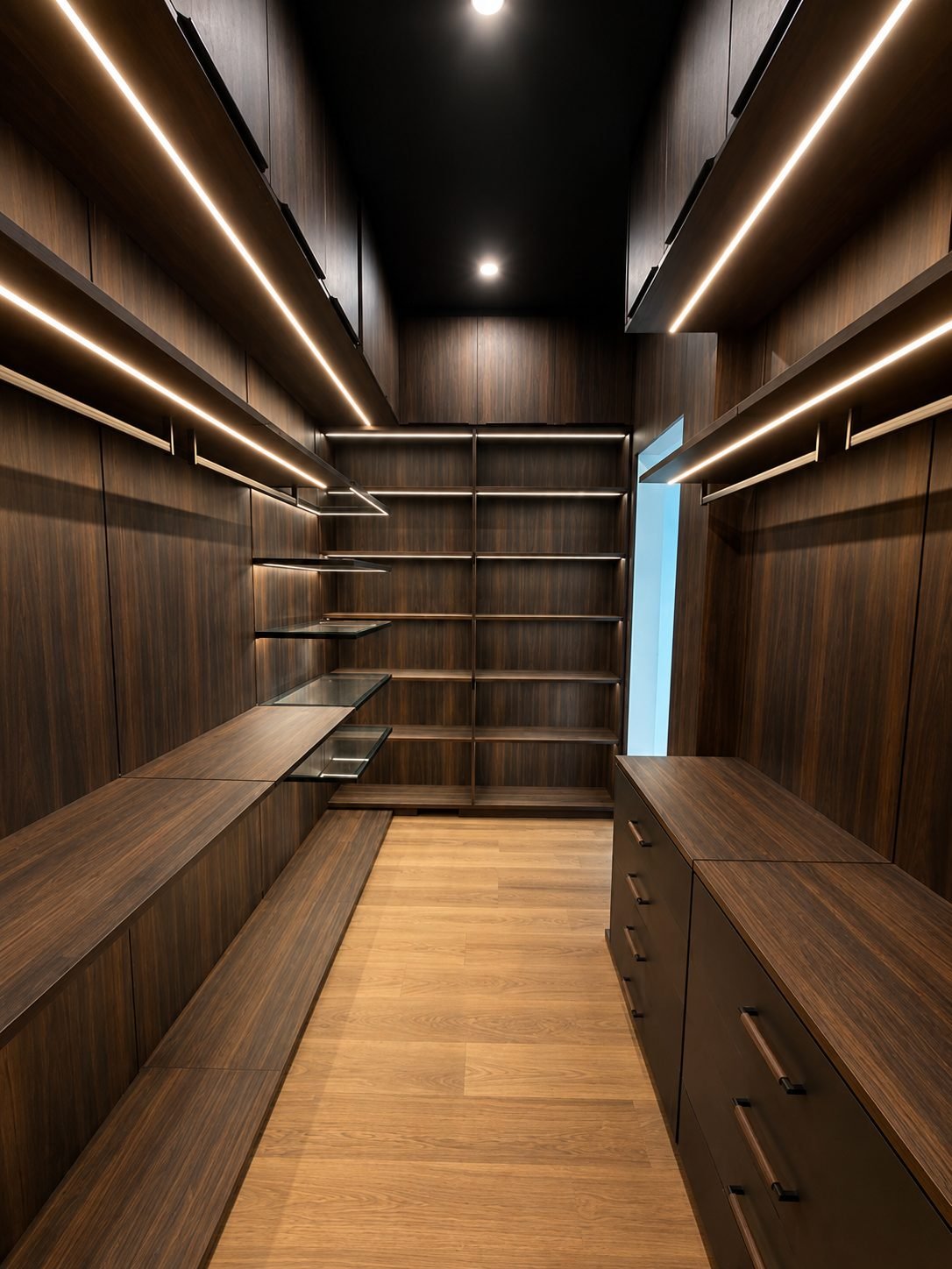 Dark walnut closet with diagonal floating glass shelves, black ceiling and light oak floor